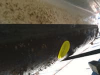 The same hull breach covered by a yellow HullSurvivor seal